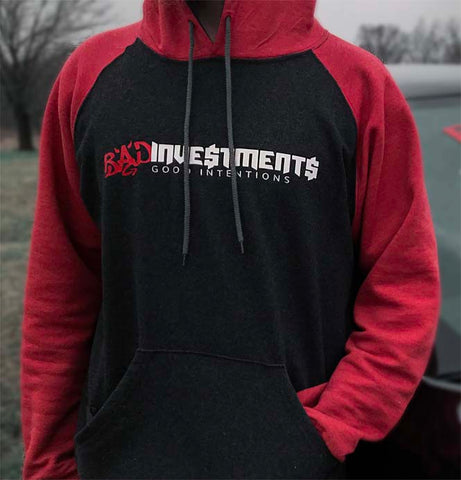 Red and dark grey comfortable unisex hoodie with full pocket on the front. Sweater has a Bad Investments logo design on the front.