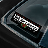 Sticker on a car window with text and a rose graphic