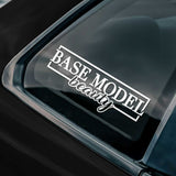 Sticker on a car window with 'BASE MODEL beauty' text