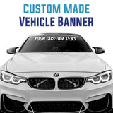 White BMW car with a customizable text banner on the windshield against a white background.