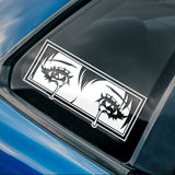 Car window with a decorative anime style sticker featuring crying eyes 