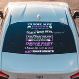 Car with a custom rear window spine bundle decals featuring various text designs.