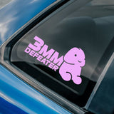 Car window with a pink '3MM Defeater' decal on a blue car.