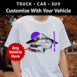 A person wearing a white t-shirt with a custom vehicle graphic print.