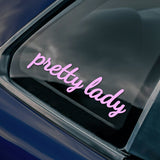 Car window with 'pretty lady' decal on a blue car