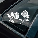 White rose decals on a car window 