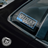 Car window with a 'Slow & Proud' sticker 