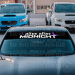 Alive After Midnight Windshield Banner Decal by Bad Investments Auto Club shown on a car. 