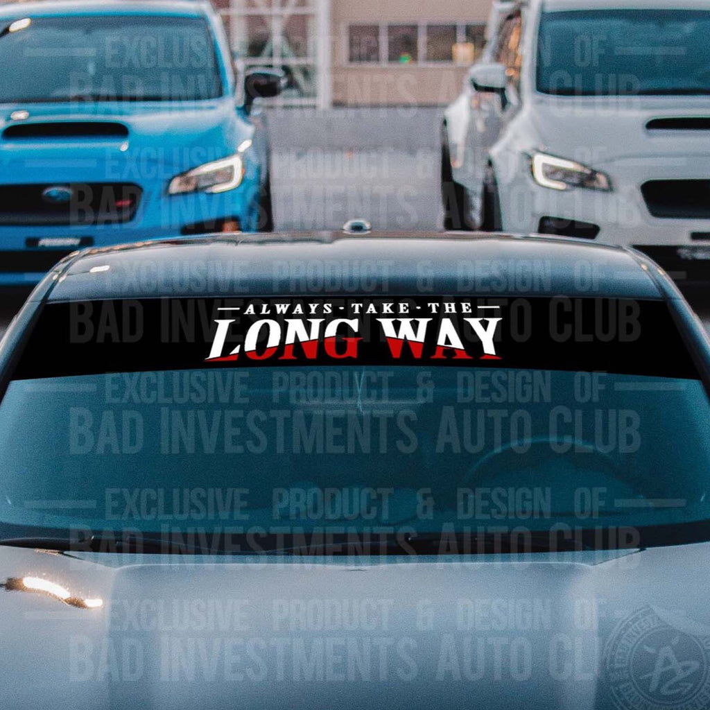 https://badinvestmentsauto.ca/cdn/shop/products/Always-Take-Long-Way-Windshield-Banner-Decal-Triangle-Car-Truck_1024x1024.jpg?v=1654636859