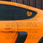 Bad luck broken heart sticker on car window by Bad Investments Auto