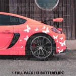 Multiple butterfly stickers solid in colour on car side bumper