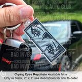 Sad Eyes with tears, anime style design on a keychain by Bad Investments Auto