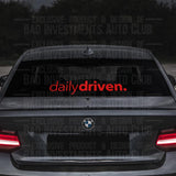 Lowercase daily driven designed sticker on car rear windshield by Bad Investments Auto