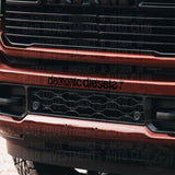 Our sister company, Demonic Diesels sticker on truck bumper by Bad Investments Auto