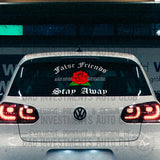 "False Friends Are Open Enemies, Stay Away" sticker design with a Rose on rear windshield of VW car