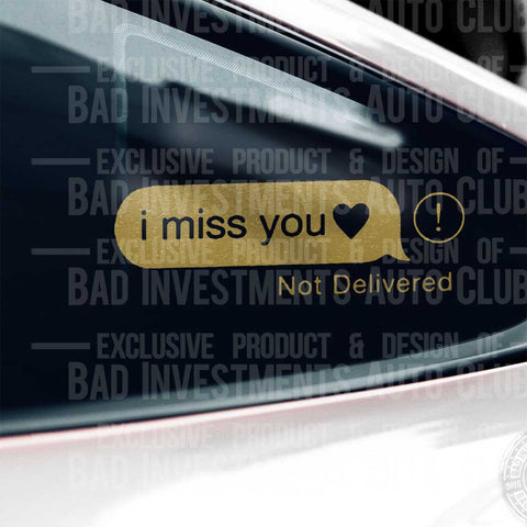 I Miss You Heart Not Delivered Sticker shown in gold vinyl on a car window