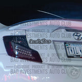 Low & Slow sticker on Toyota car bumper by Bad Investments Auto