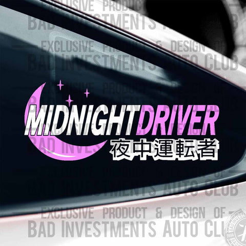 Pink and white Midnight Driver with Japanese and English letters, moon and star symbols vinyl sticker on car window