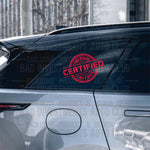 Shitbox Certified round sticker on SUV window by Bad Investments Auto