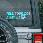 "Tell Your Dog I Say Hi" with cute paw print teal vinyl decal on Jeep truck rear window by Bad Investments Auto