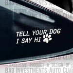 "Tell Your Dog I Say Hi" with cute paw print white vinyl decal on car window by Bad Investments Auto