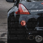 Bad Investments Auto round smoking skull "we are bad" slap sticker on Nissan car rear bumper